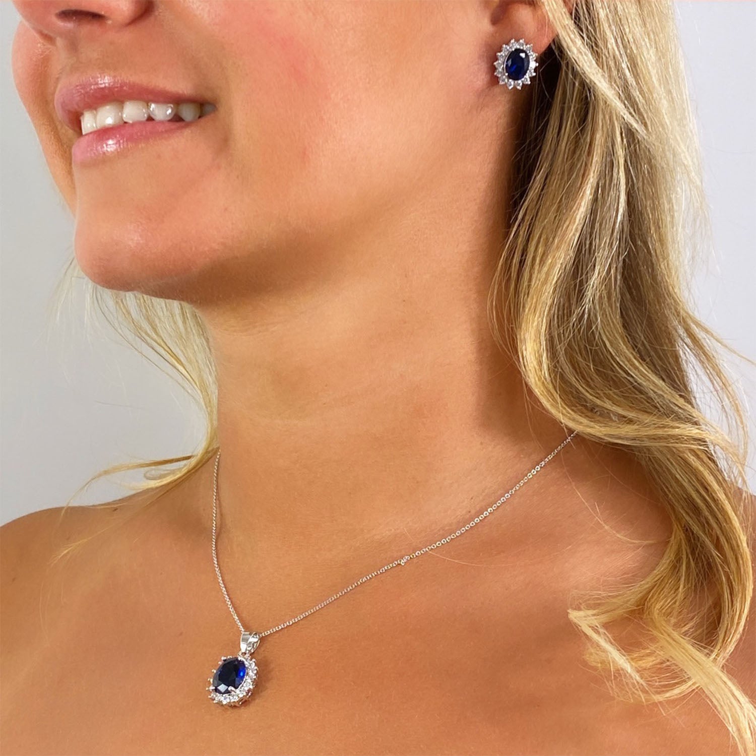 Isla 2 Ct. Oval Cut CZ Sapphire Stud Earrings, Silver - Zahra Jewelry